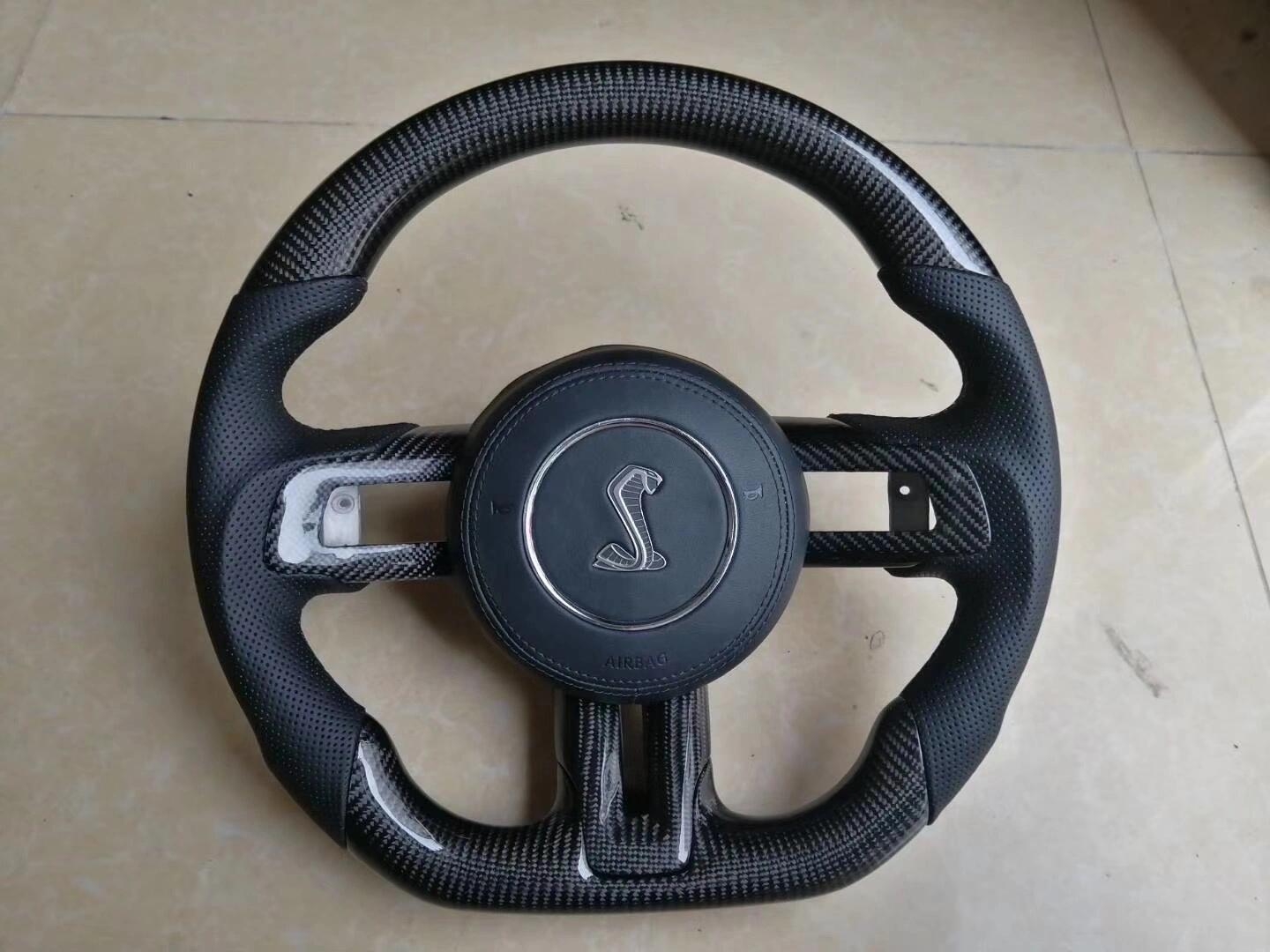 Suitable for 15-23 Mustang carbon fiber and perforated leather steering wheels
