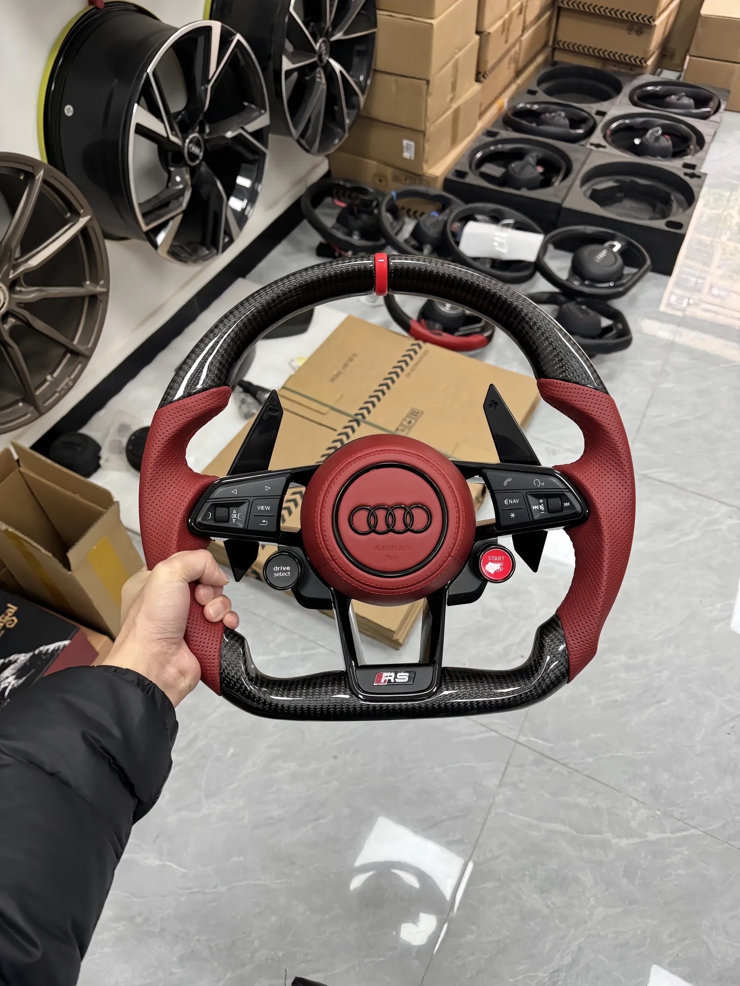 As shown carbon fiber and perforated leather Audi R8 steering wheel is also suitable for the old Audi model