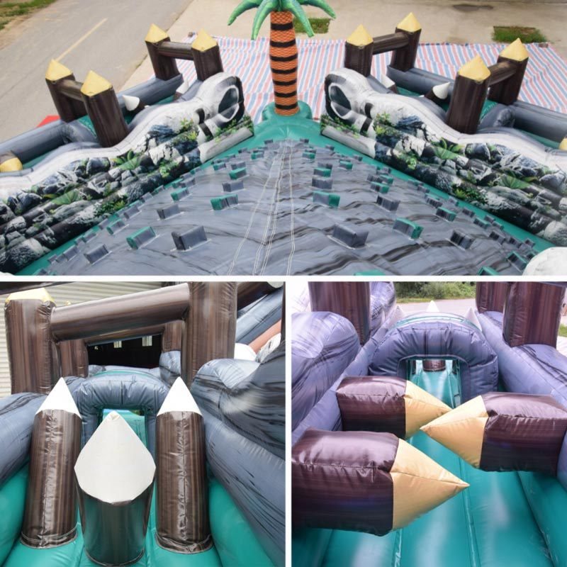 rocky island obstacle course with rock climbing slide