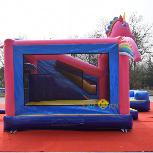 Unicorn bounce house slide combo