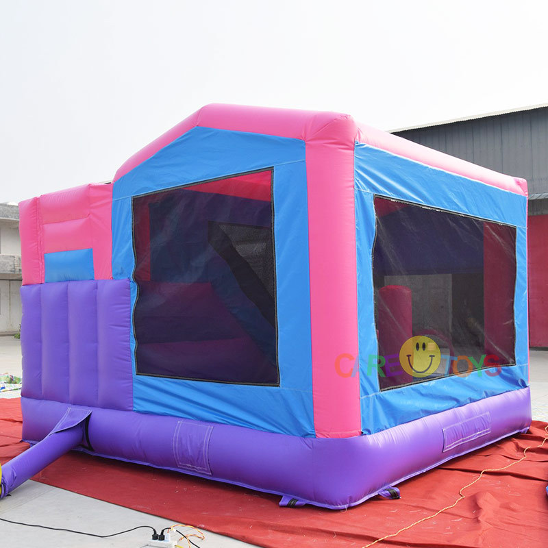 Pink Girls Bounce house slide with banner