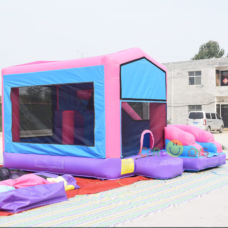 Pink Girls Bounce house slide with banner