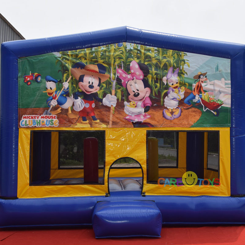 Inflatable moonwalk bounce house with banner