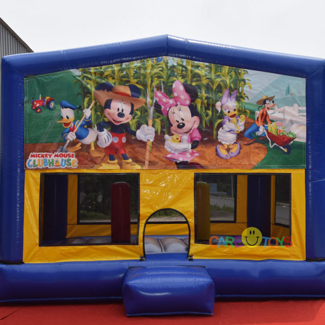 Inflatable moonwalk bounce house with banner
