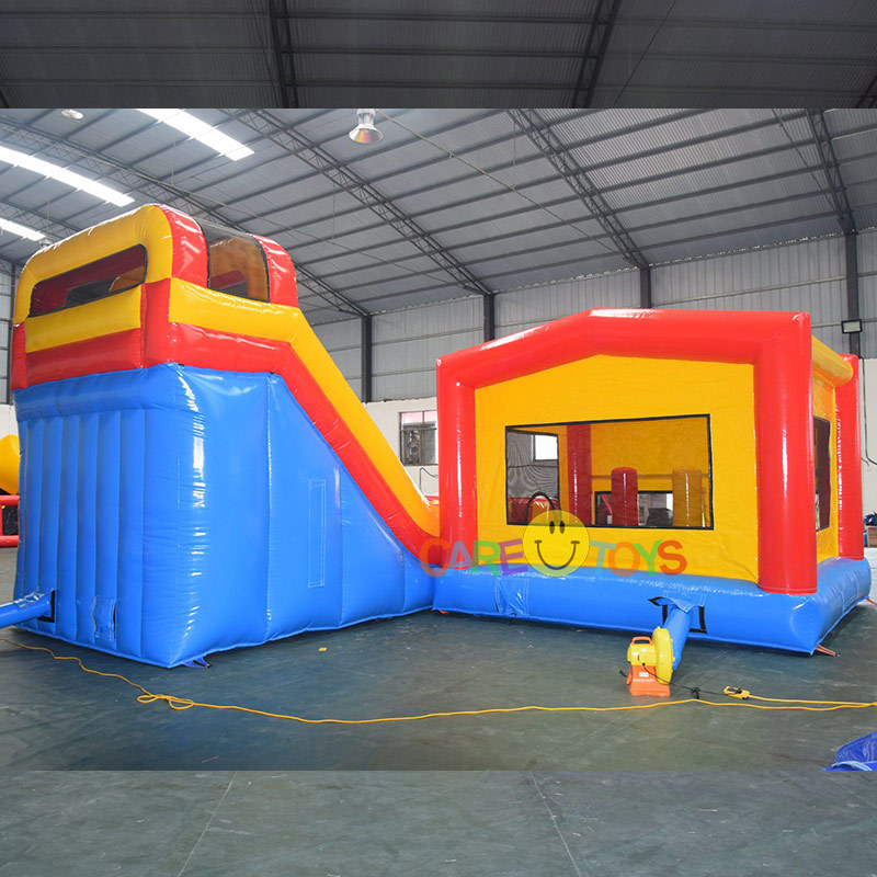Inflatable moonwalker with slide