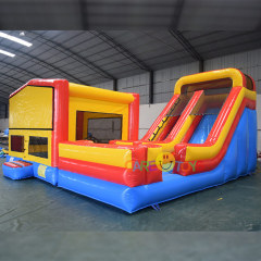 Inflatable moonwalker with slide