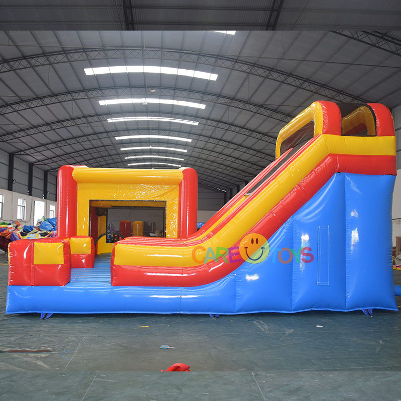 Inflatable moonwalker with slide