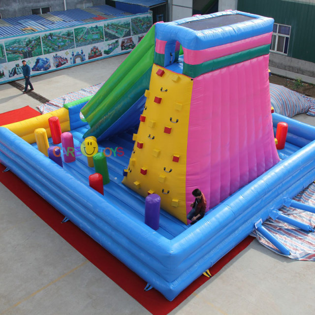 Inflatable rock climbing slide