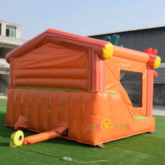 Western Cabin bounce house with slide