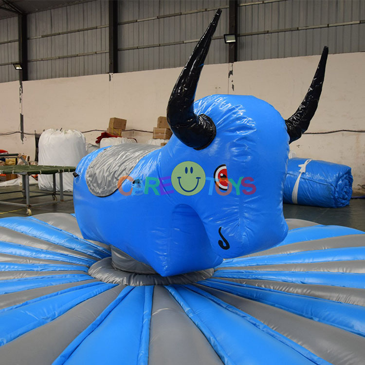 Pull down inflatable riding bull