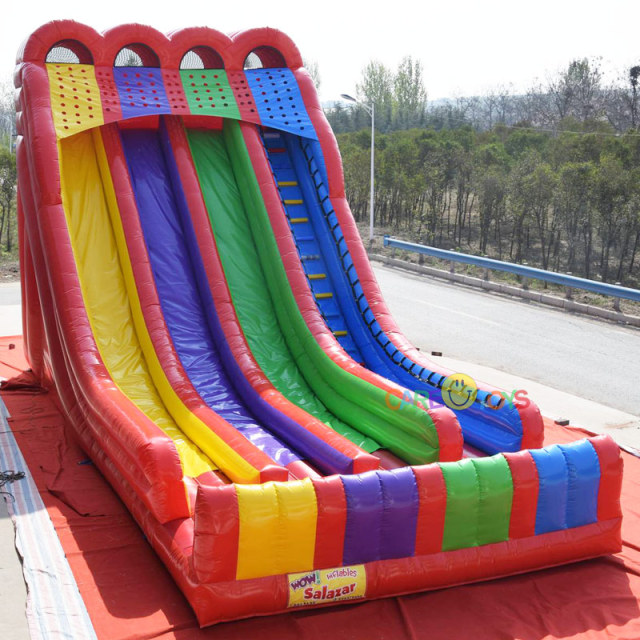 Triple lane rainbow inflatable slide