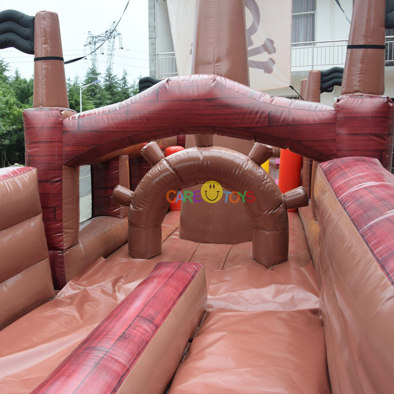 Giant inflatable pirate ship slide with obstacle