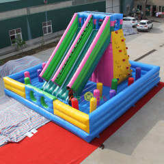 Inflatable rock climbing slide
