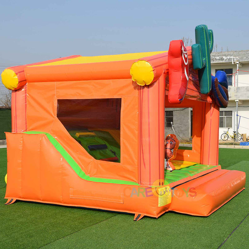 Western Cabin bounce house with slide