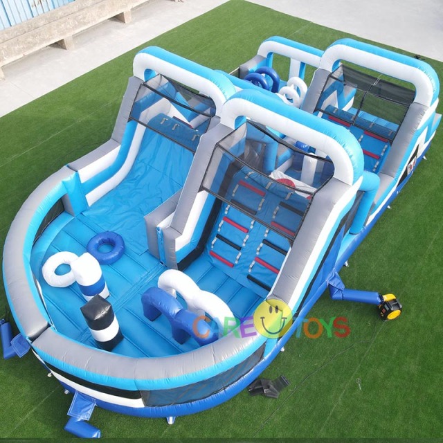 White blue U-Turn inflatable kids fun run obstacle course