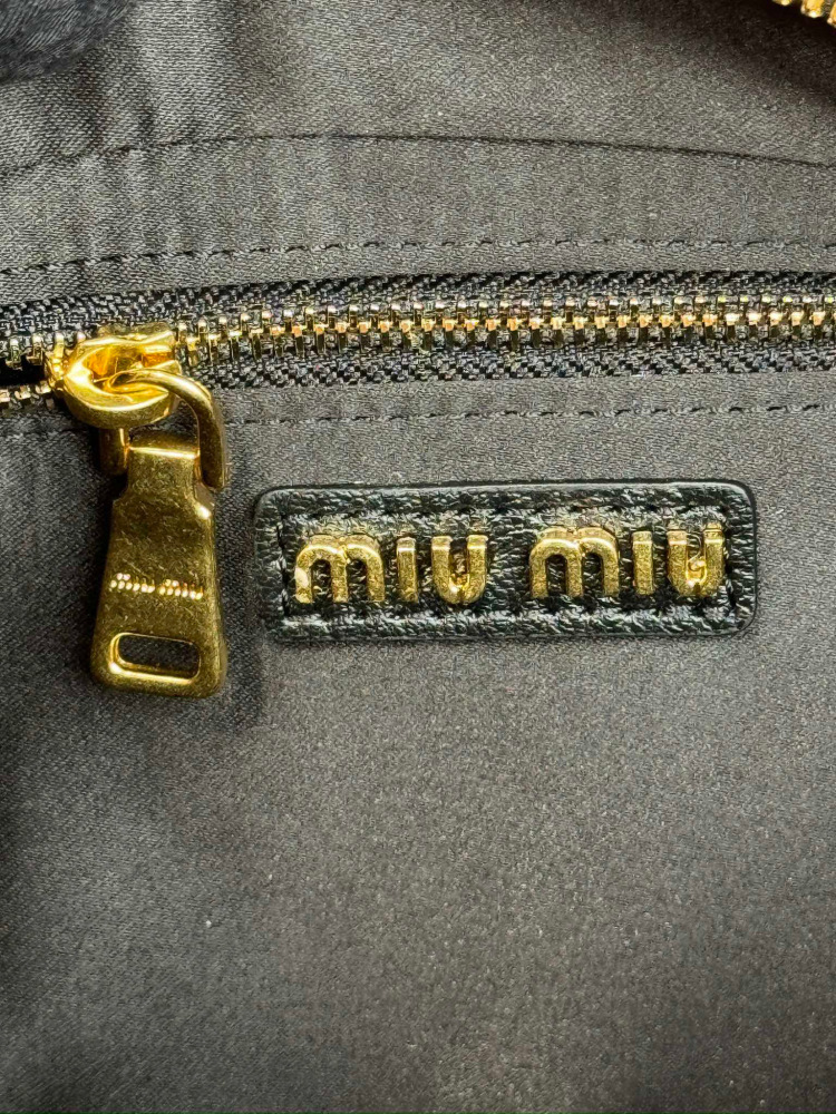 MiuMiu Arcadie Matelasse sling bag