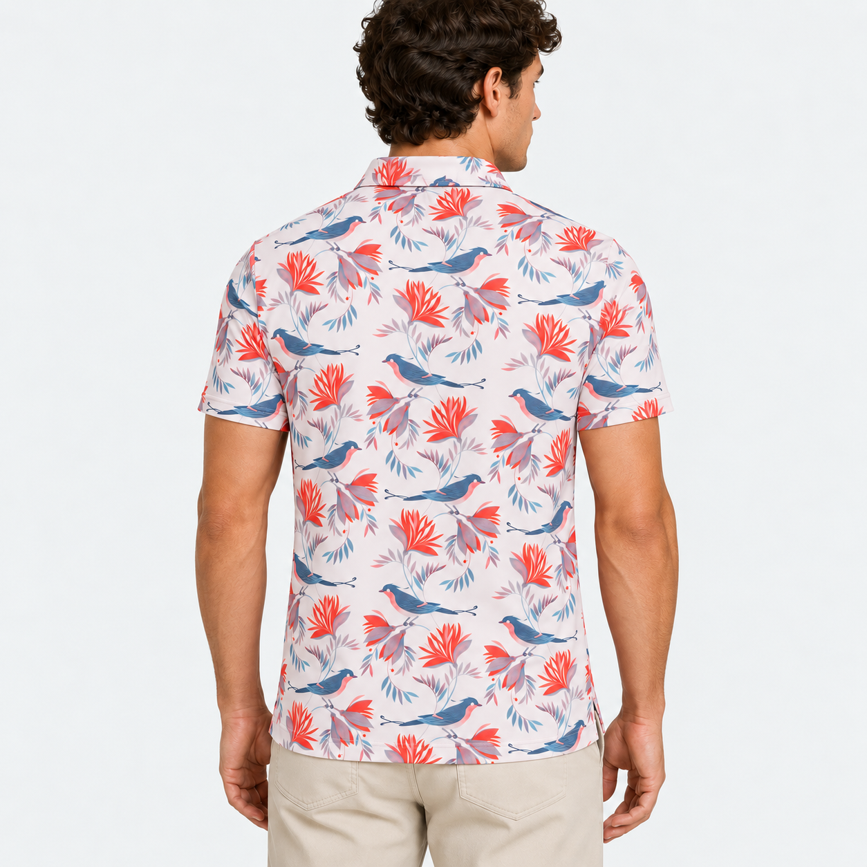 Back view of men's patterned golf polo shirt with full print design