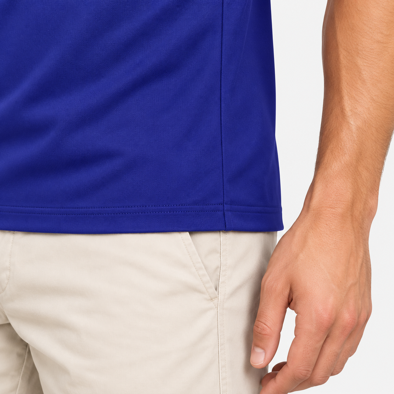 Royal blue golf polo shirt hem and fabric detail for men