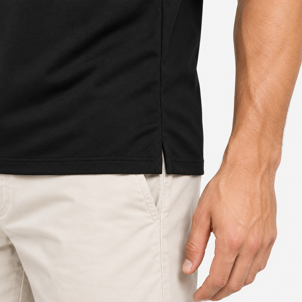 Mens black golf polo side slit hem detail
