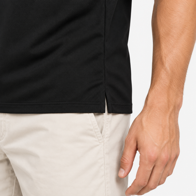 Mens black golf polo side slit hem detail