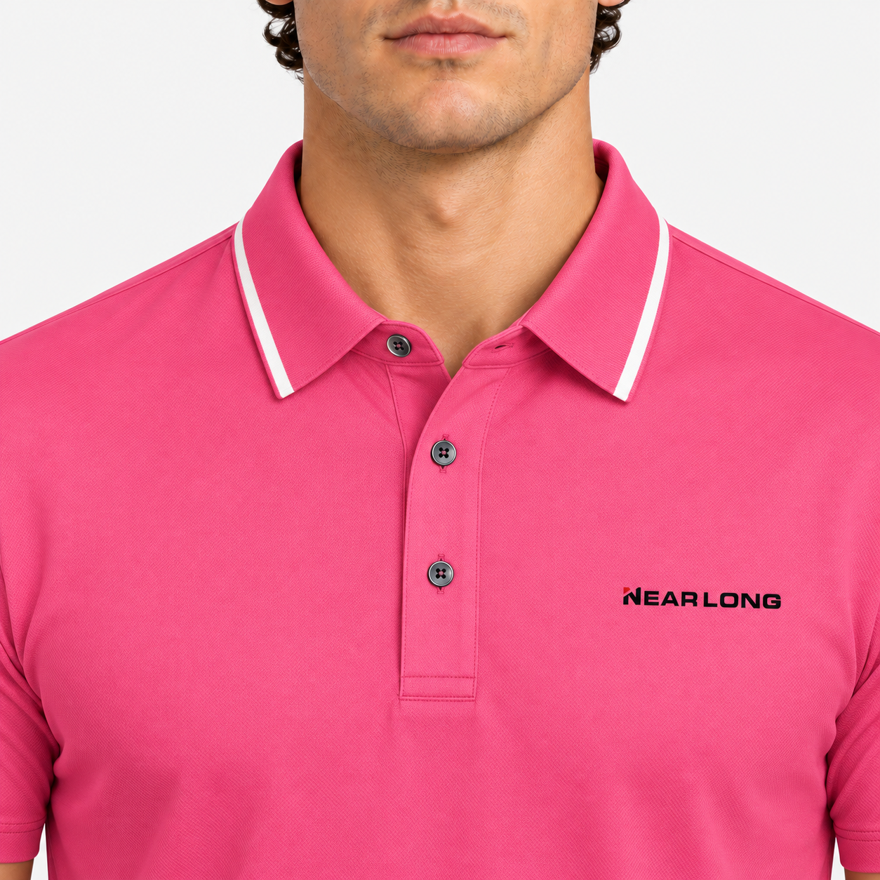 Men's pink golf polo shirt collar and logo detail