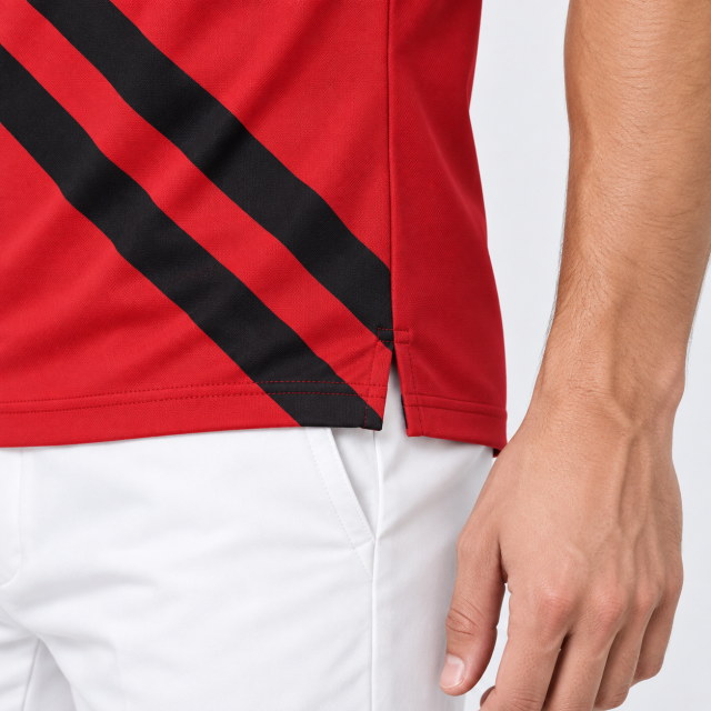 Men's golf polo side vent and diagonal stripe hem detail
