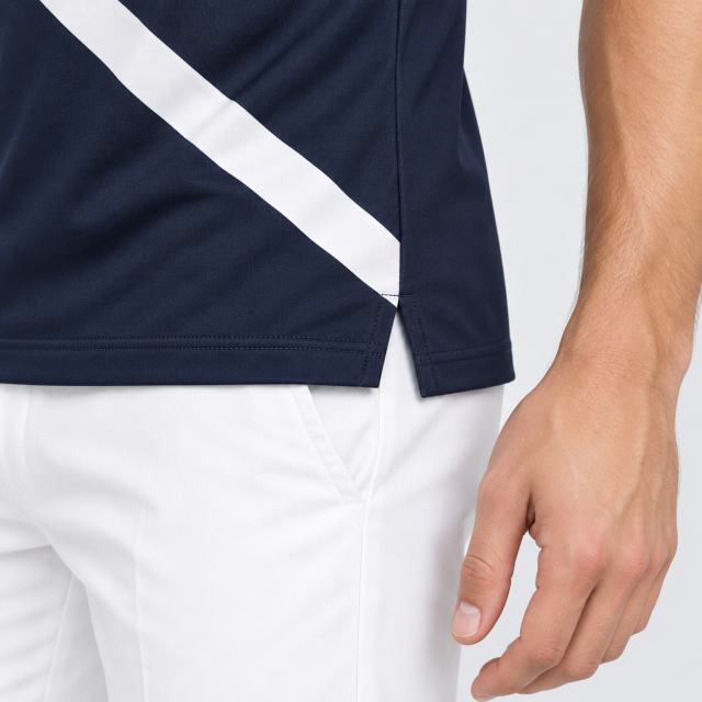 Navy golf polo side vent and white stripe hem detail