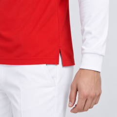 Side hem vent detail of men's long sleeve golf polo