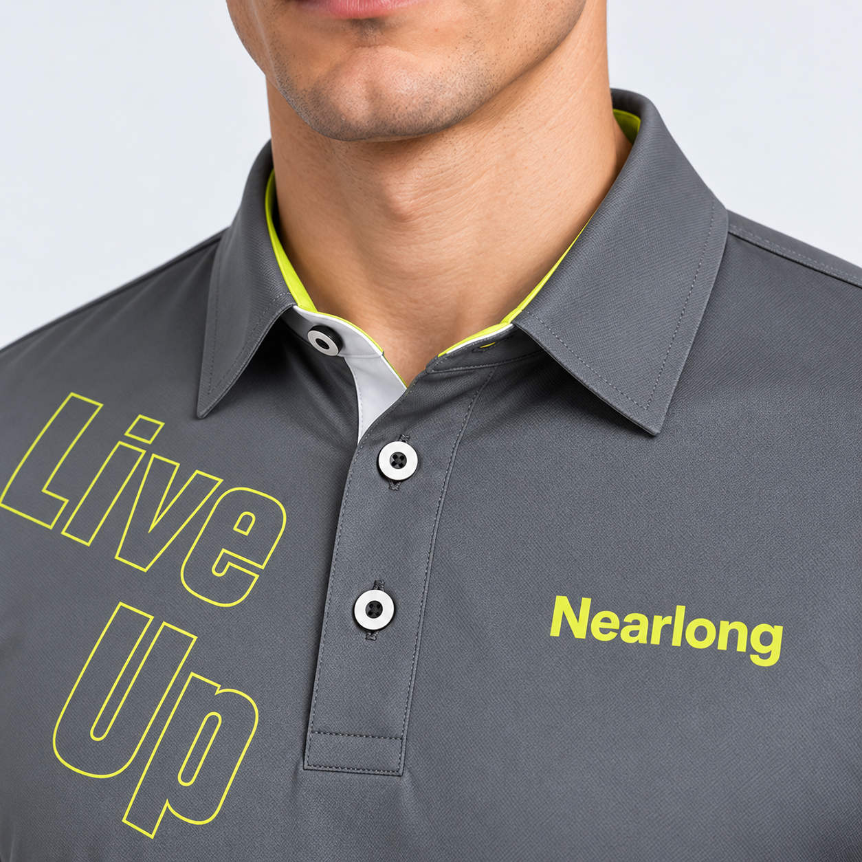 Gray golf polo shirt collar and yellow graphic detail
