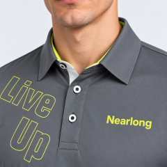 Gray golf polo shirt collar and yellow graphic detail