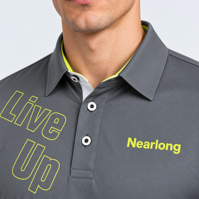 Gray golf polo shirt collar and yellow graphic detail