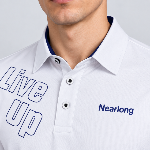 Men's white graphic golf polo shirt collar and chest detail