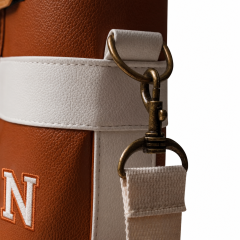 Vintage golf bag strap hardware and metal clip detail