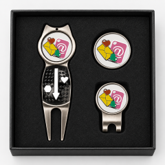 Unique golf divot repair tool gift set with ball marker and hat clip