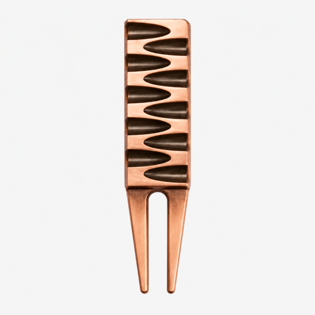 Copper-tone golf divot tool with textured grip front view