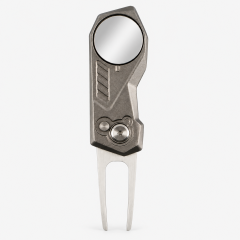 Front view of metal golf divot tool with round ball marker and two-prong fork