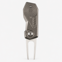 Back view of two-prong metal golf divot repair tool with textured metal body
