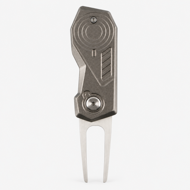 Back view of two-prong metal golf divot repair tool with textured metal body