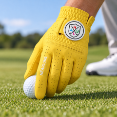 Yellow sheepskin golf glove on golf course with breathable full-finger design
