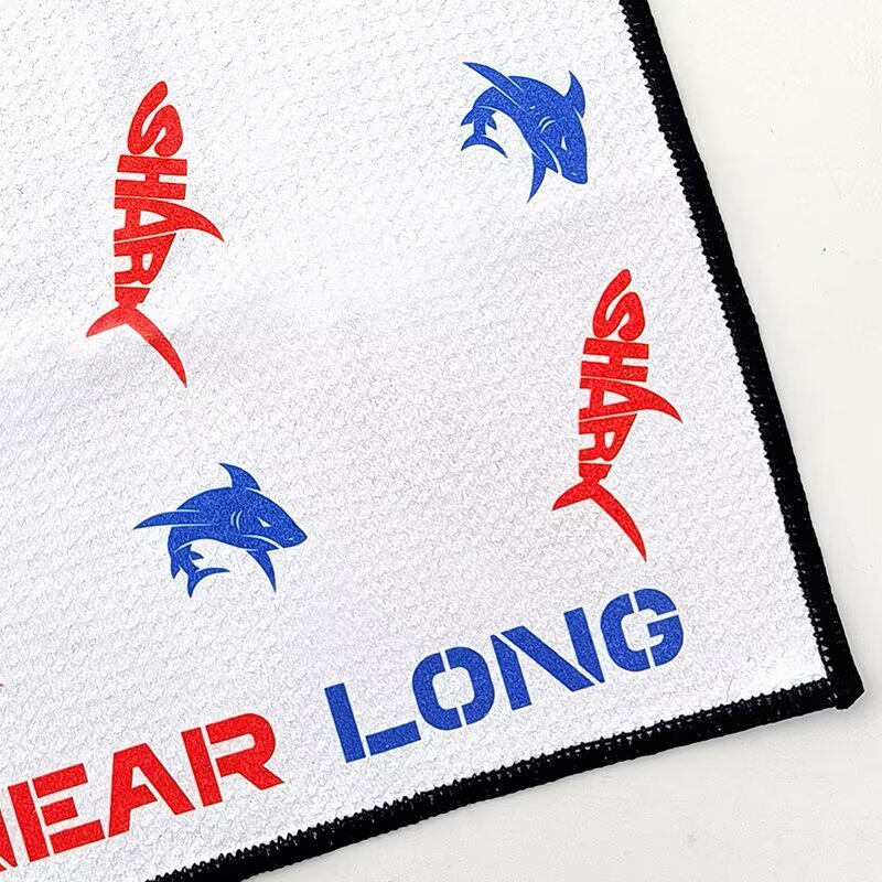 Custom printed golf towel with all-over logo pattern