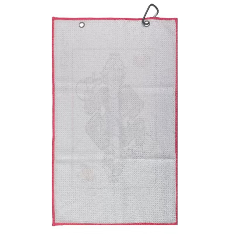 Textured golf towel reverse with metal grommets and clip