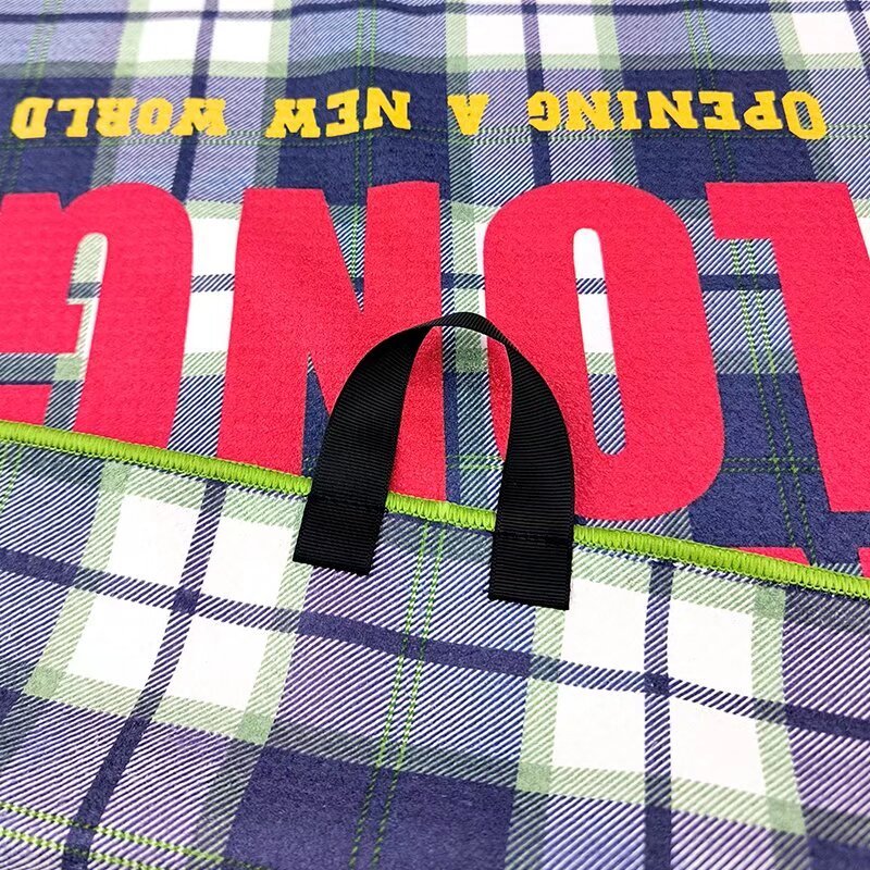 Custom golf towel with center hanging loop and plaid print