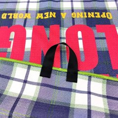 Custom golf towel with center hanging loop and plaid print