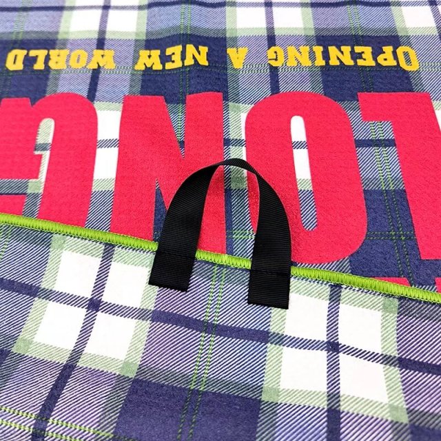 Custom golf towel with center hanging loop and plaid print