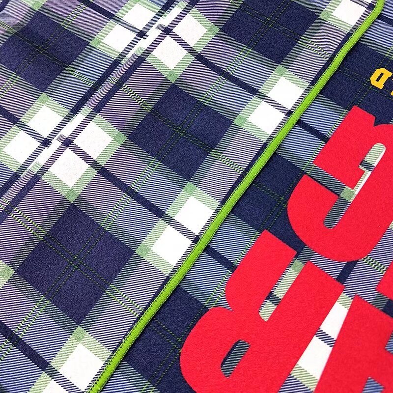 Custom pattern golf towel with navy green and white plaid design