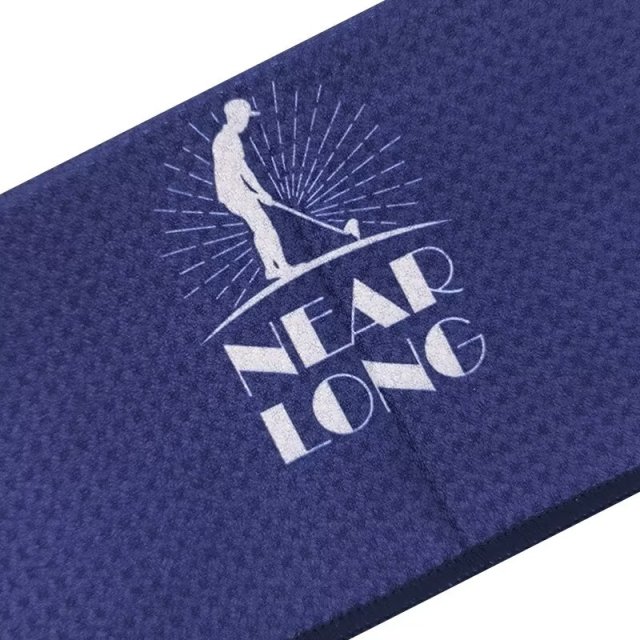 Custom golf bag towel with white logo on navy textured surface