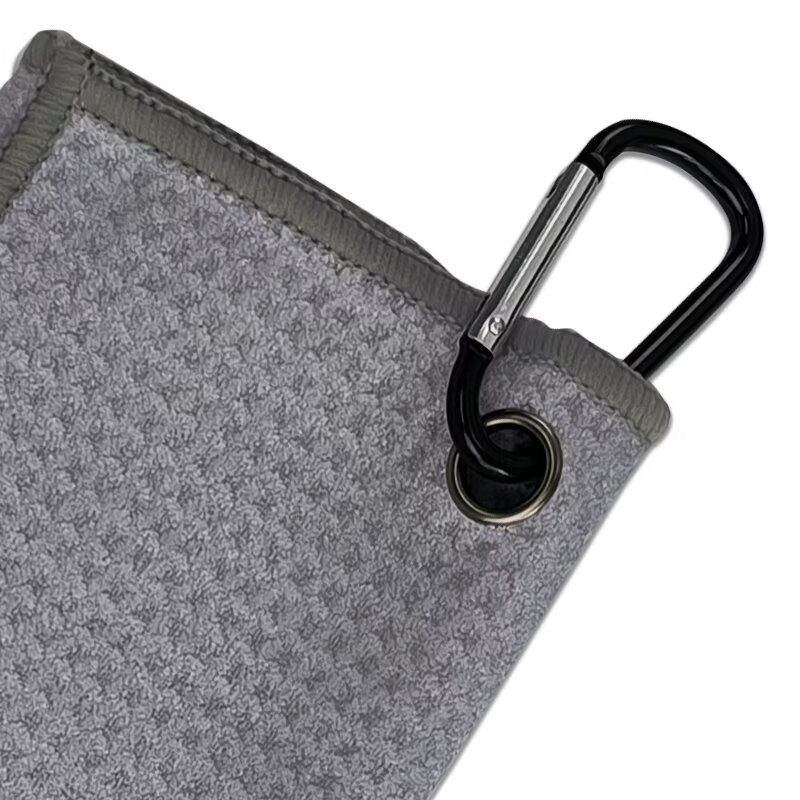 Golf towel with carabiner hook and reinforced metal grommet