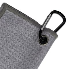 Golf towel with carabiner hook and reinforced metal grommet