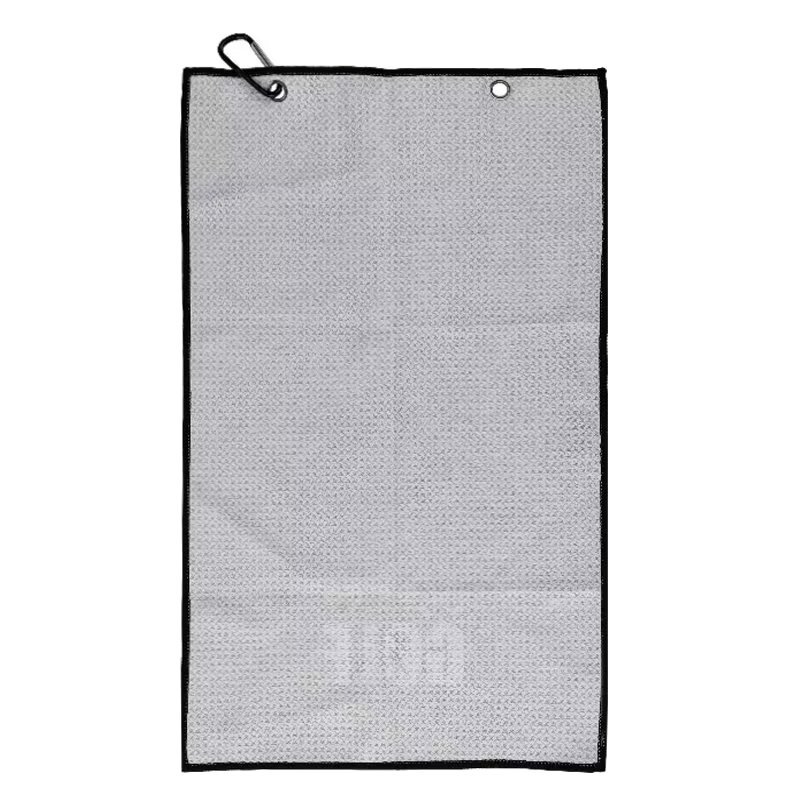 Textured golf towel reverse with grommet attachment and clip