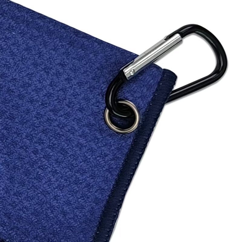 Golf towel with carabiner clip and reinforced metal grommet